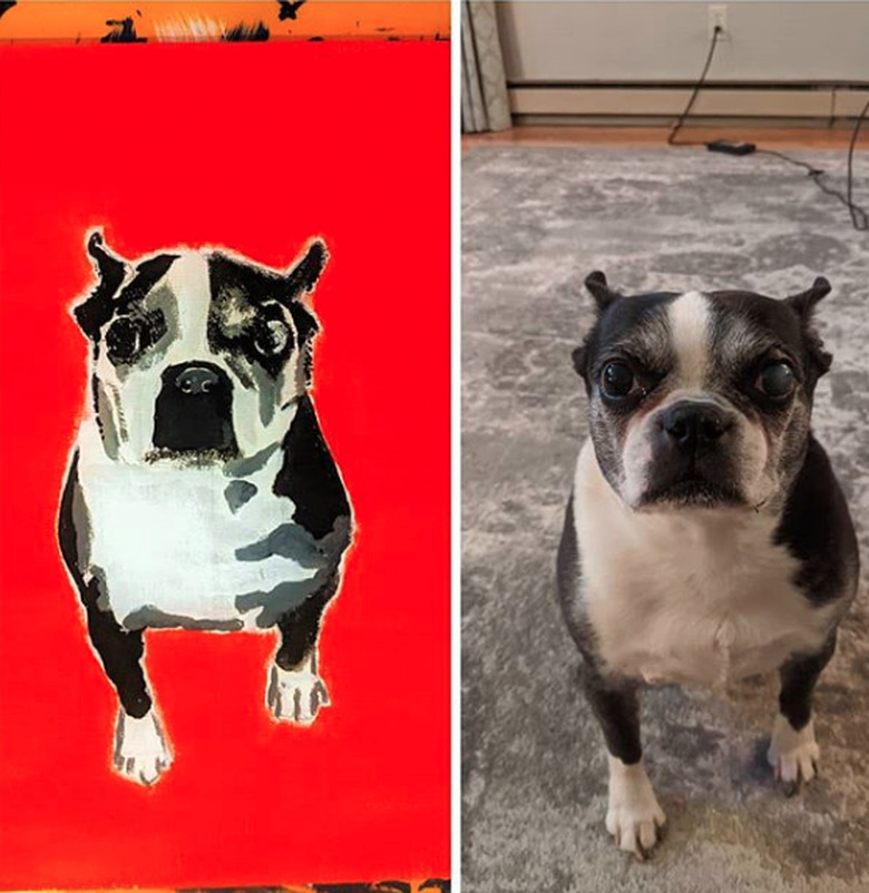 boston terrier next to his custom portrait.