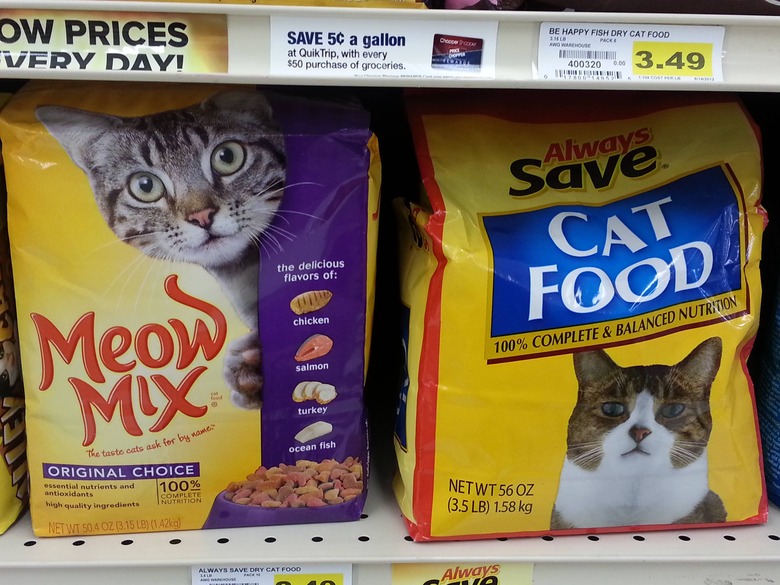 A bag of no-name cat food with a really sad cat on the package.