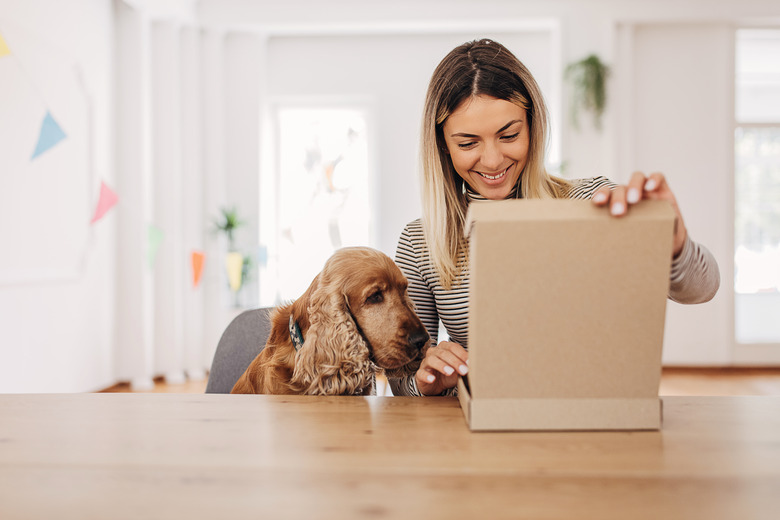 Woman opening a package