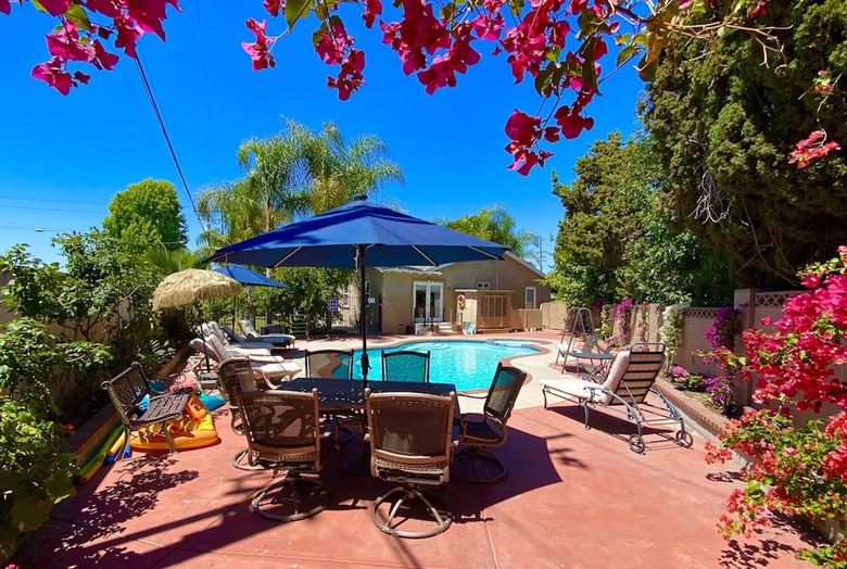 Pool and patio backyard at El Paraiso Villa home in Anaheim