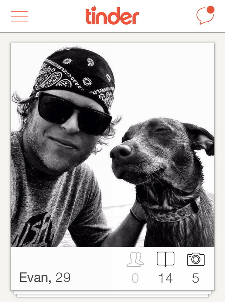 Man poses with dog for selfie in Tinder picture