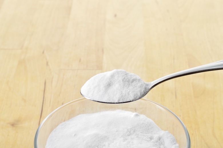 Close-up of baking soda on spoon.