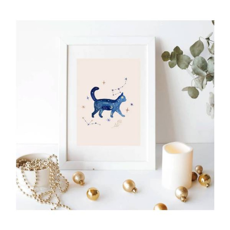 A digital file of a cat surrounded by constellations in watercolor style that