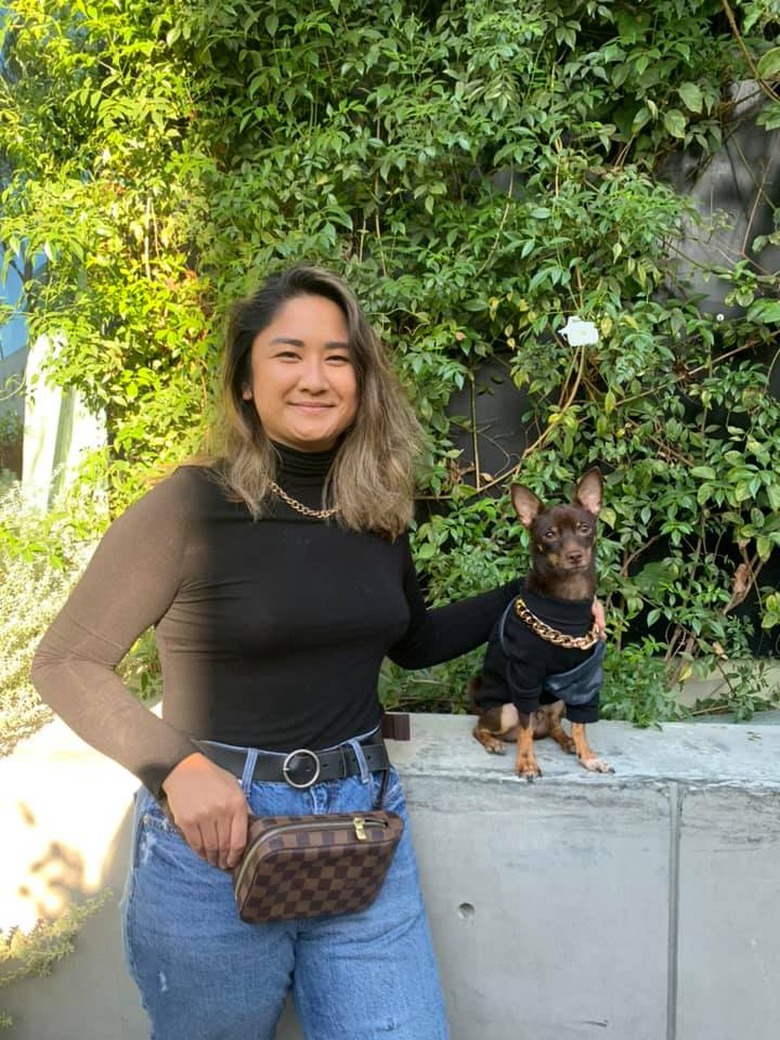 woman reenacts The Rock in a turtleneck photo