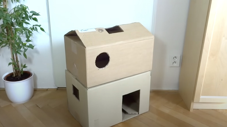 Two cardboard boxes stacked on top of each other