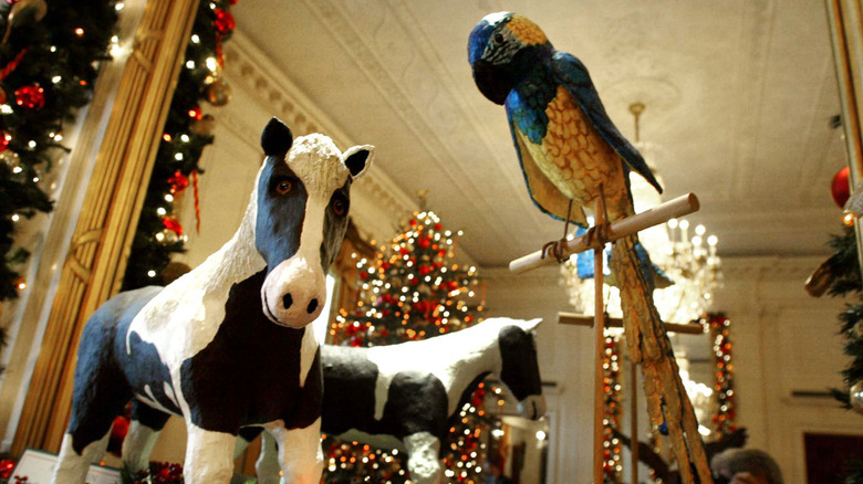 Holiday decorations depicting a presidential pony and parrot