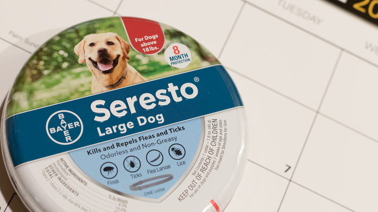 A close-up of a Seresto flea collar tin