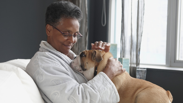 dog on owner's lap